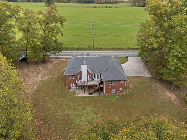 birds eye view of property featuring a rural view