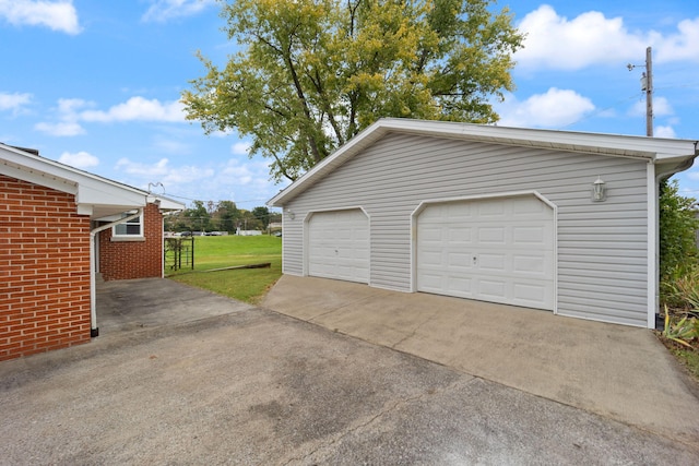 garage with a yard