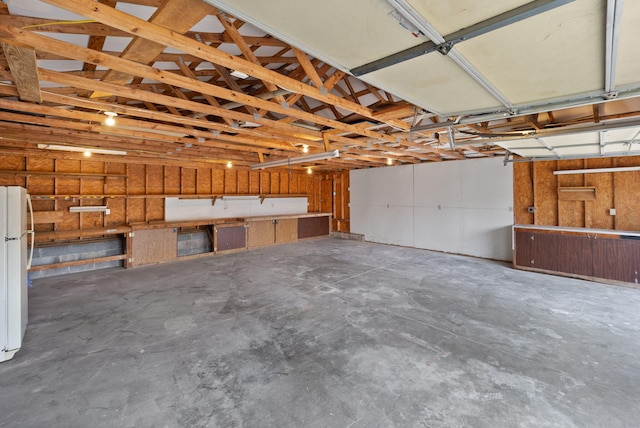 garage featuring white refrigerator