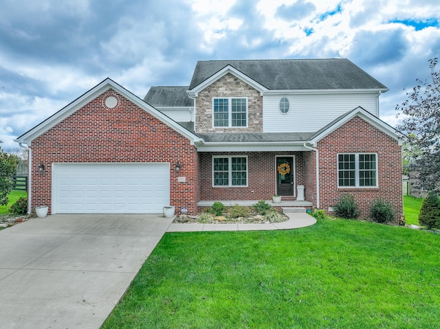 view of front of property with a front yard and a garage