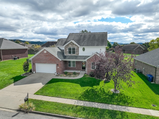 view of front facade with a front lawn and a garage