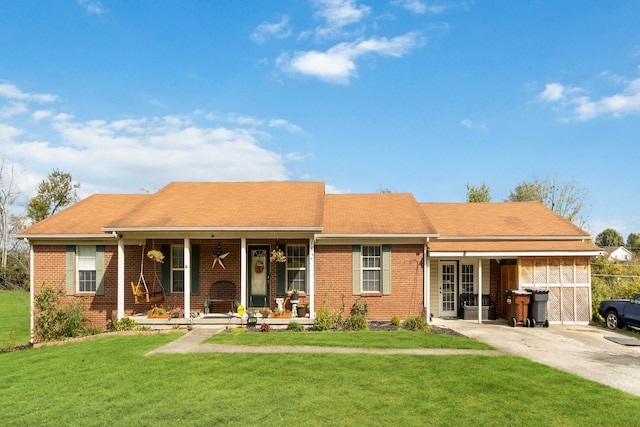 view of front of property with a porch and a front lawn