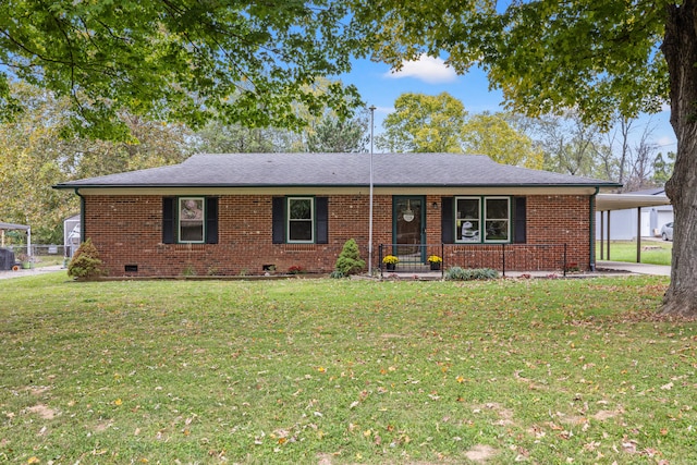 single story home with a front lawn, covered porch, and a carport