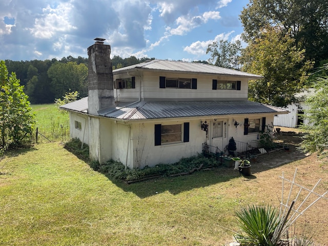 view of front facade featuring a porch and a front yard