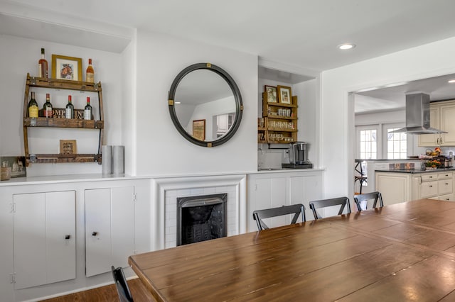 dining space with hardwood / wood-style floors