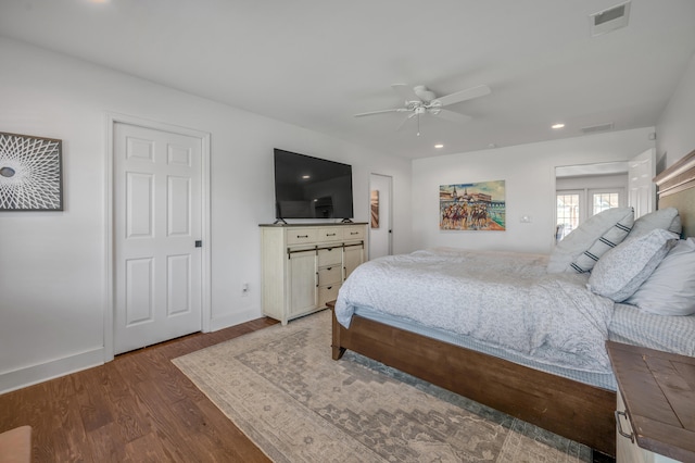 bedroom featuring wood-type flooring and ceiling fan