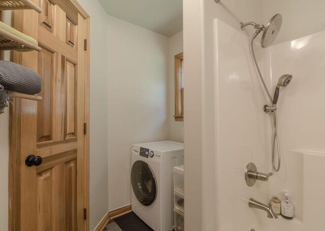 laundry room featuring washer / dryer