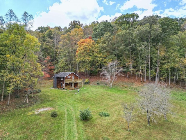 bird's eye view featuring a forest view