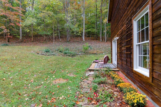 view of yard featuring a view of trees