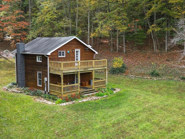 view of outbuilding with a forest view