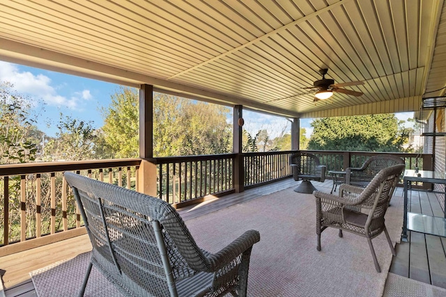 view of patio / terrace with ceiling fan and a wooden deck