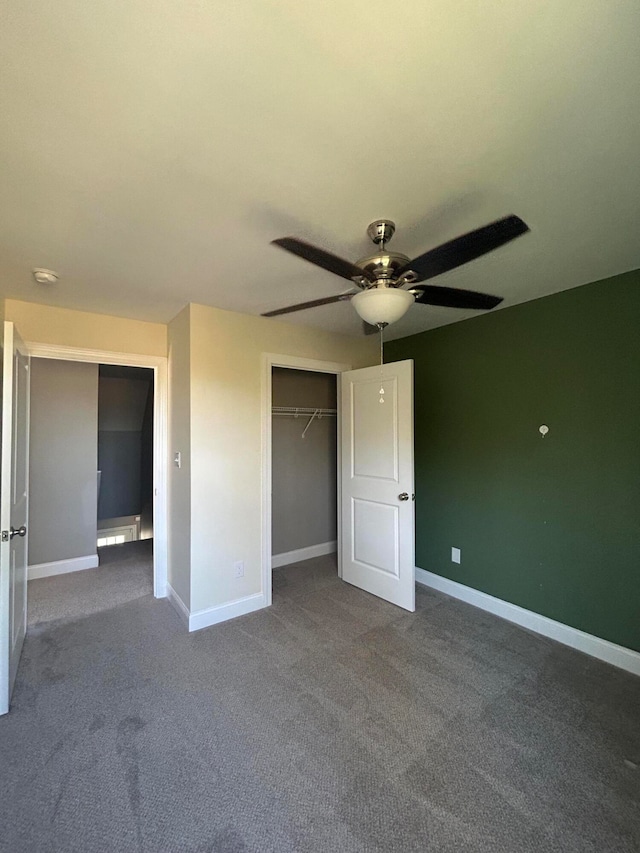 unfurnished bedroom featuring a closet, carpet, and ceiling fan