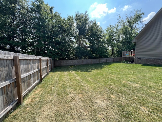 view of yard with a deck