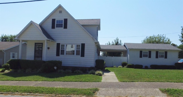 view of front of home with a front yard