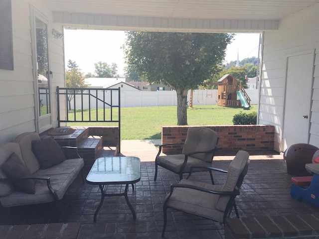 view of patio featuring a playground