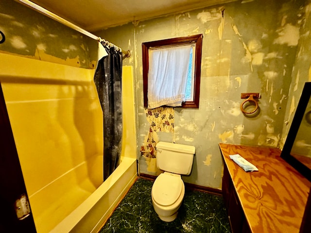 bathroom featuring shower / bath combination with curtain and toilet