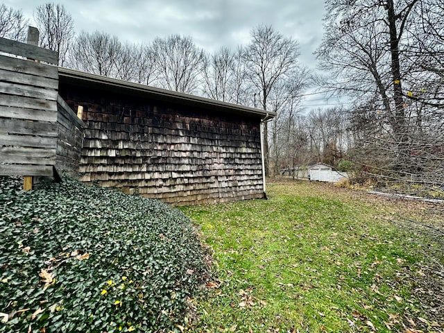 view of property exterior featuring a yard