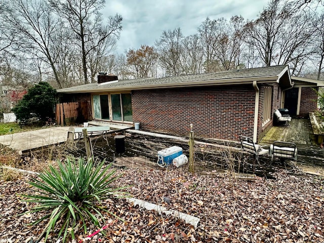 back of house with a patio