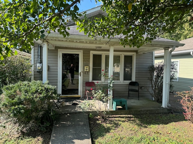 entrance to property with a porch