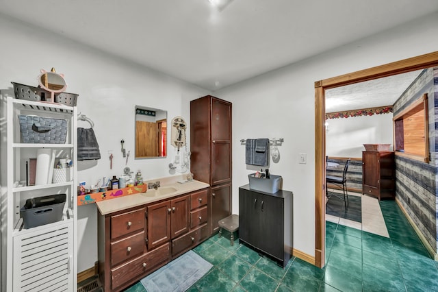 bathroom featuring vanity and tile patterned floors