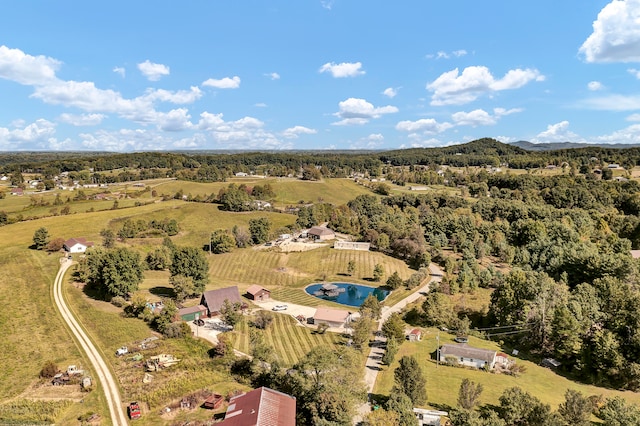 birds eye view of property featuring a rural view