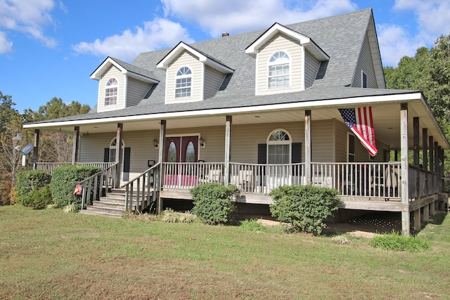 country-style home featuring a front yard and a porch