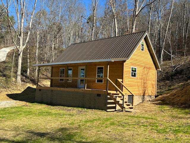 rustic home featuring crawl space and metal roof