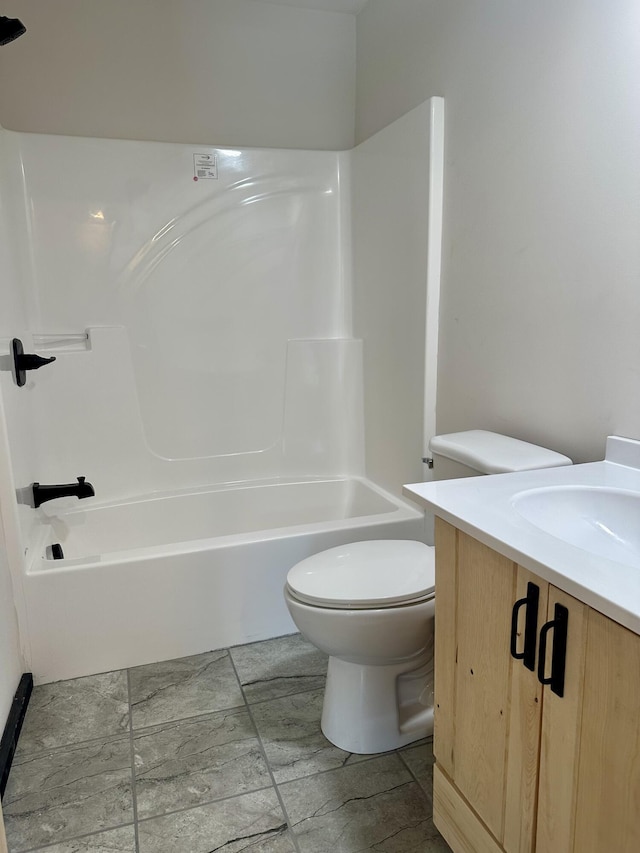 409 Freeman Branch Rd, East Bernstadt, KY 40729 - bathroom with toilet, vanity, and tub / shower combination