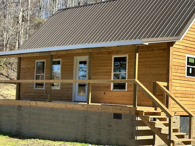 exterior space featuring metal roof