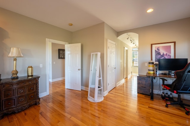 home office featuring light hardwood / wood-style flooring