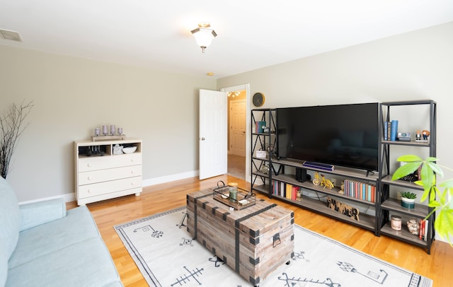 living room with hardwood / wood-style floors