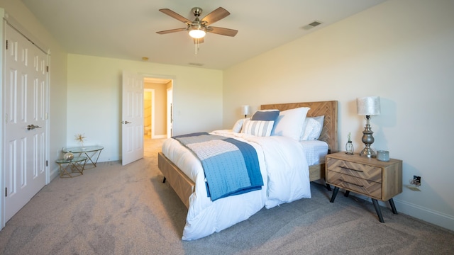 carpeted bedroom featuring ceiling fan