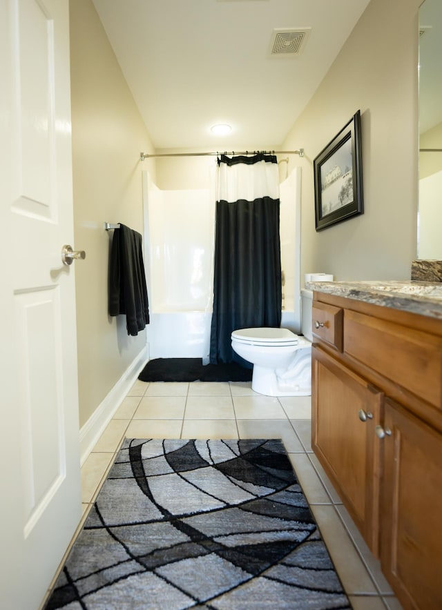 full bathroom with toilet, tile patterned flooring, vanity, and shower / tub combo with curtain