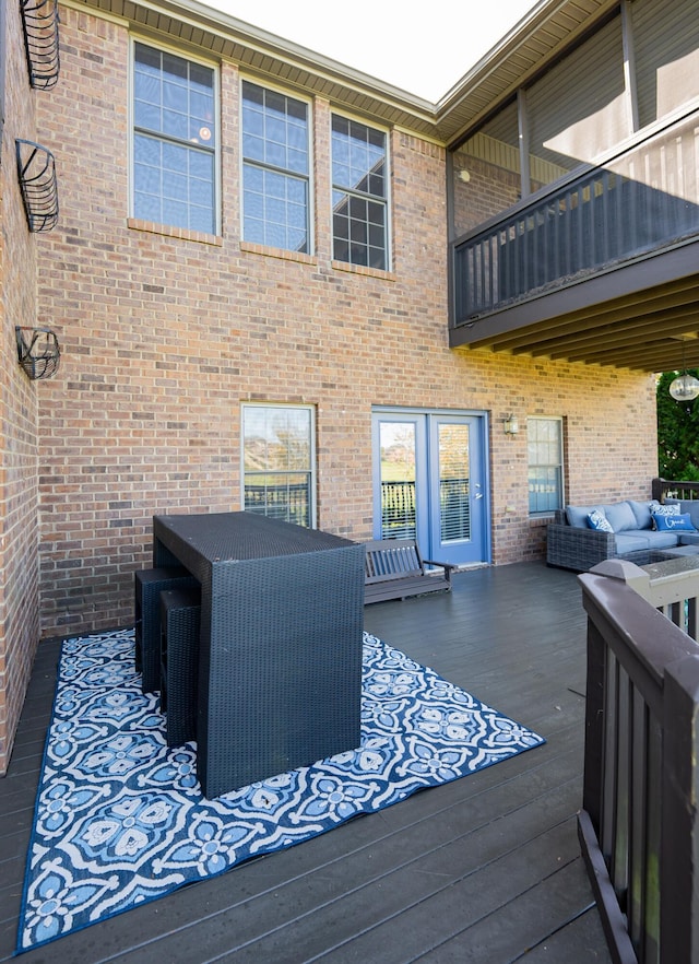 wooden deck featuring an outdoor living space