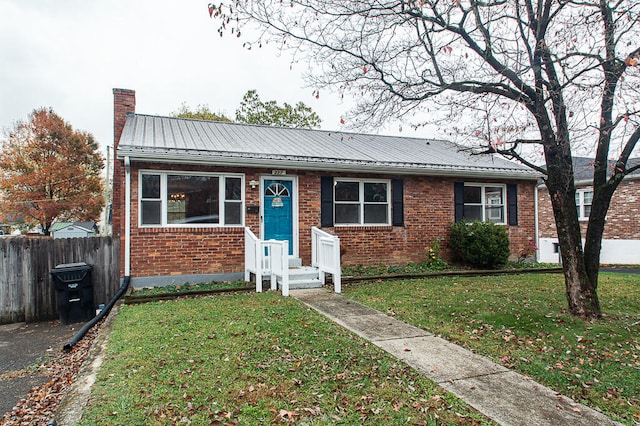 view of front of house with a front yard