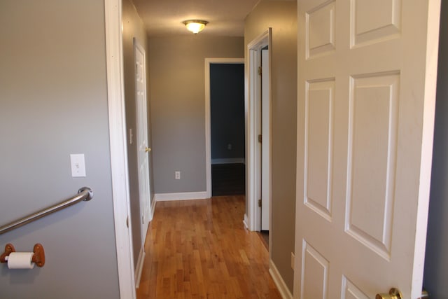 corridor featuring light wood-type flooring