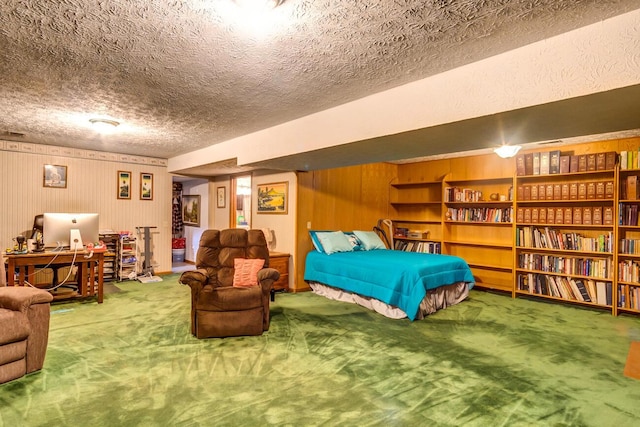 living room with a fireplace, a textured ceiling, and carpet floors