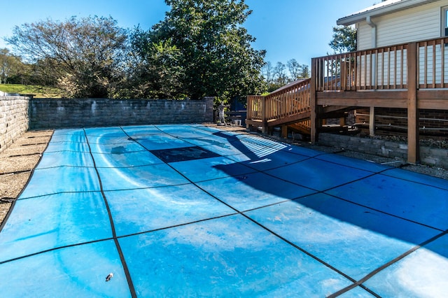 view of pool with a deck