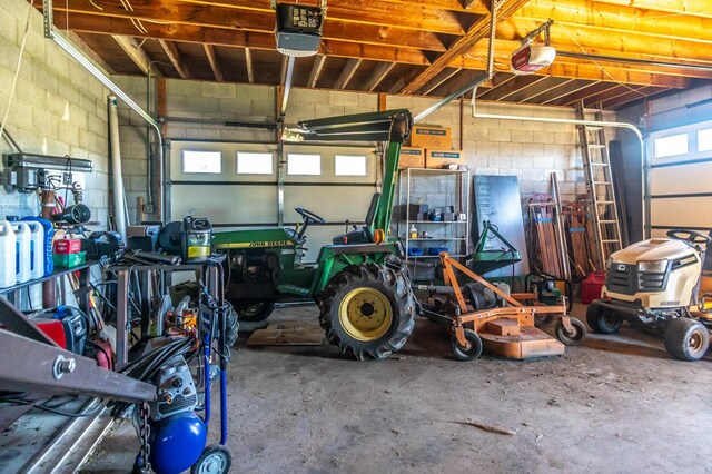 garage featuring a garage door opener