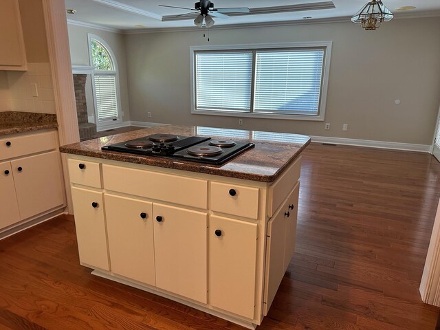 empty room featuring ceiling fan, light hardwood / wood-style flooring, and vaulted ceiling