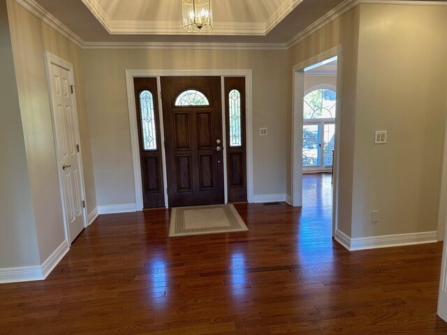 hallway with dark hardwood / wood-style flooring and crown molding