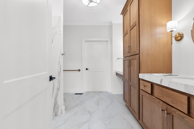 bathroom featuring vanity and crown molding