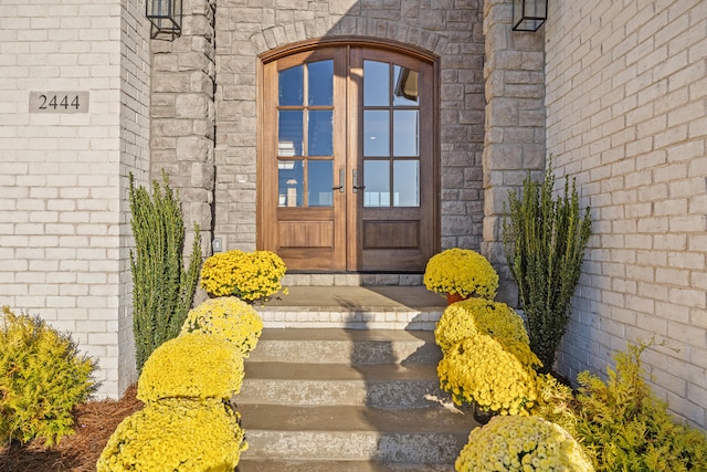 entrance to property featuring french doors