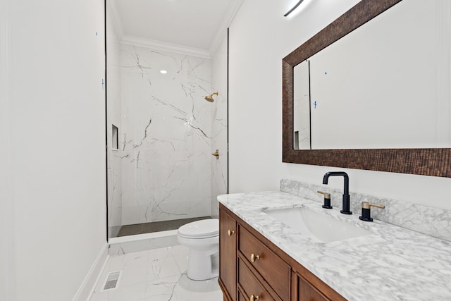 bathroom with vanity, tiled shower, ornamental molding, and toilet