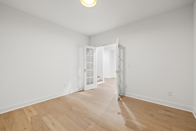 unfurnished room featuring light hardwood / wood-style flooring