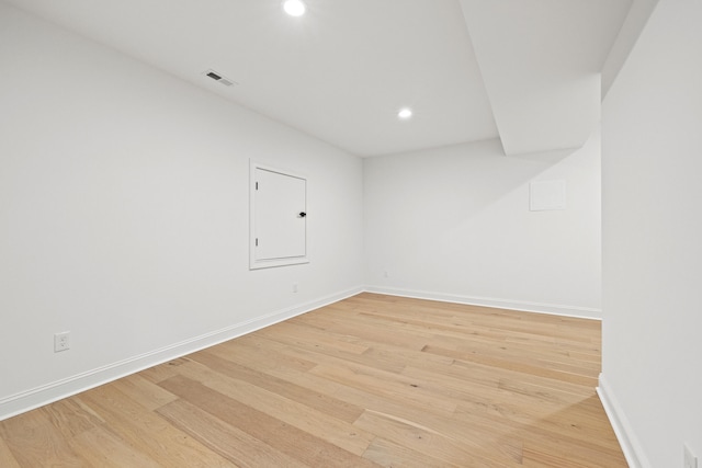 empty room with light wood-type flooring