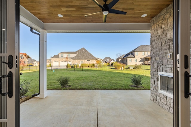 view of patio / terrace featuring ceiling fan