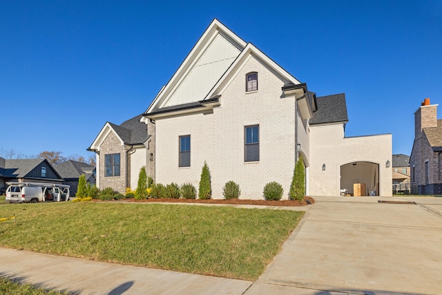 view of front of home with a front yard