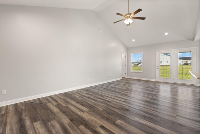 unfurnished living room featuring high vaulted ceiling, dark hardwood / wood-style floors, and ceiling fan