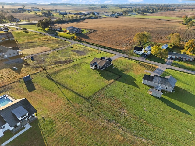 birds eye view of property featuring a rural view